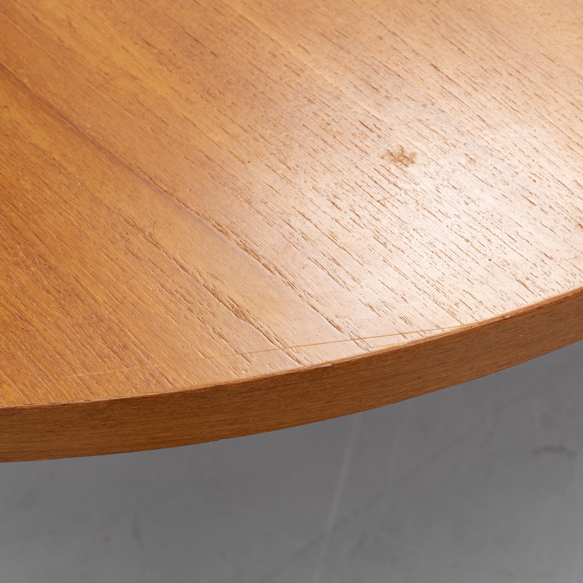 A teak dining table, second half of the 20th century.