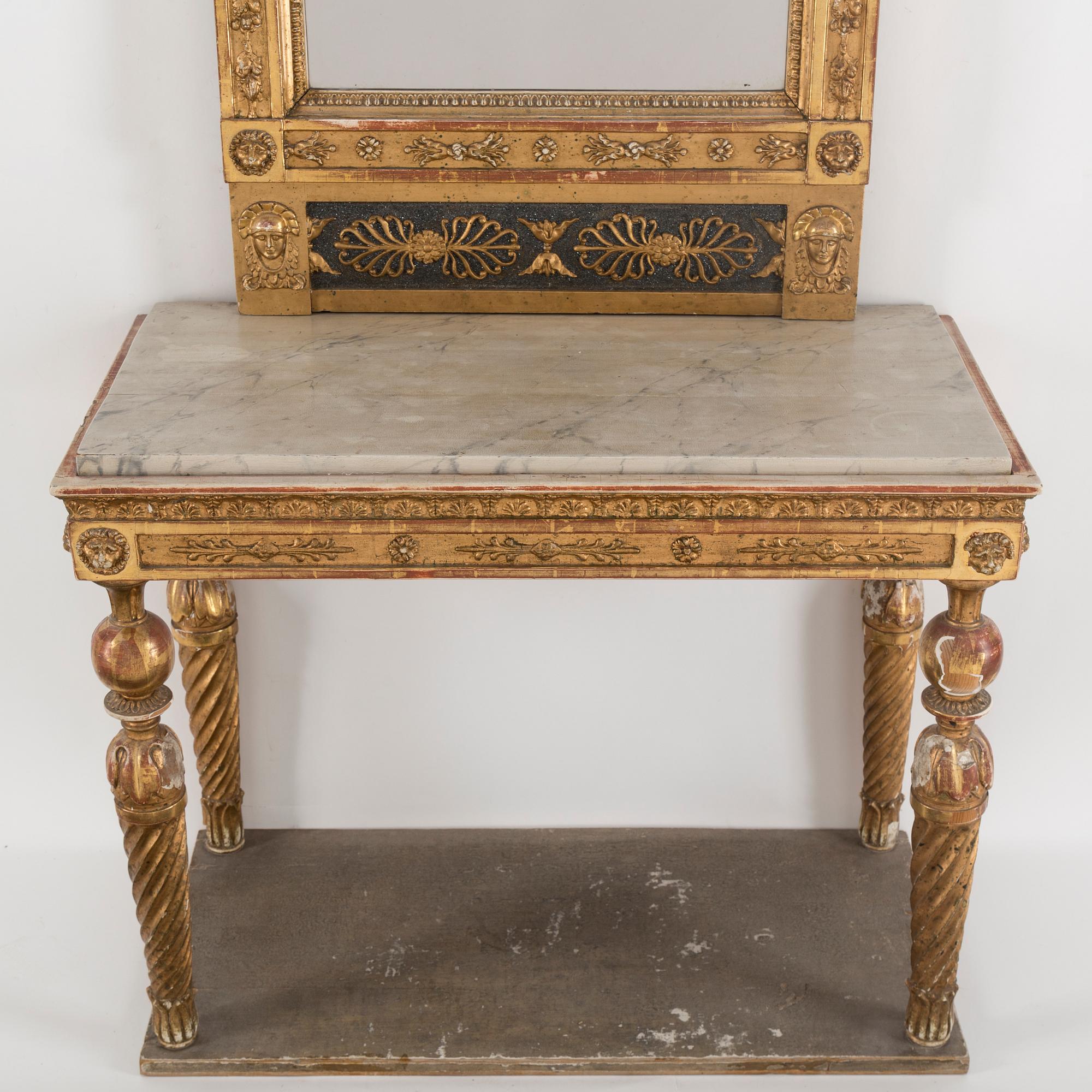 A gilt mirror dated 1816 by CM Fogelgren, linköping with a console table.