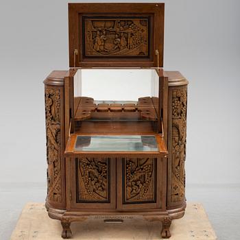 a chinese style bar cabinet from the late 20th century.