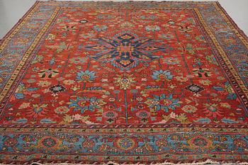 A carpet, an antique/semi-antique Heriz, ca 352 x 275 cm.