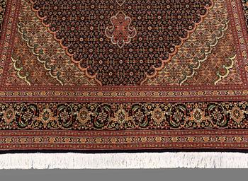 A RUG, Tabriz, part silk, so called 50 Radj, around 220 x 150 cm.