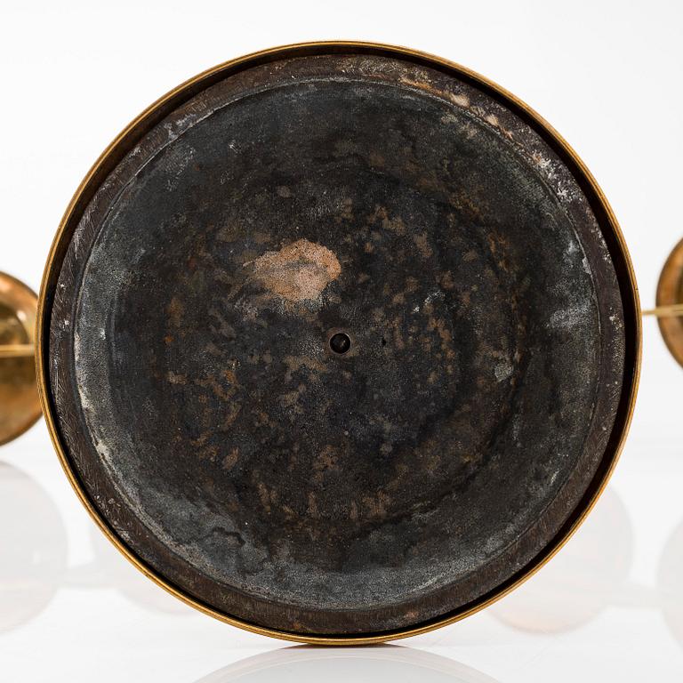 A pair of brass candelabras, early 20th century.