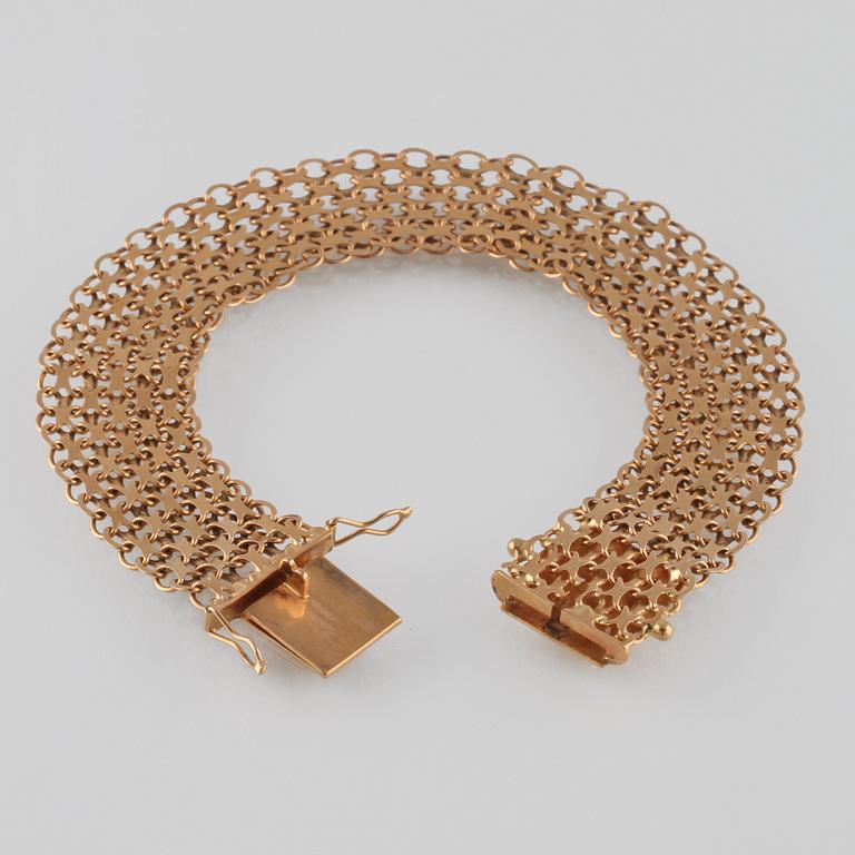 ARMLÄNK, 18K guld, Stockholms ädelsmide, 1964. Vikt 16,1 gram.