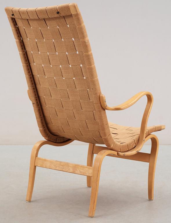 A Bruno Mathsson beech and paper webbing easy chair, Karl Mathsson, Värnamo 1940's.