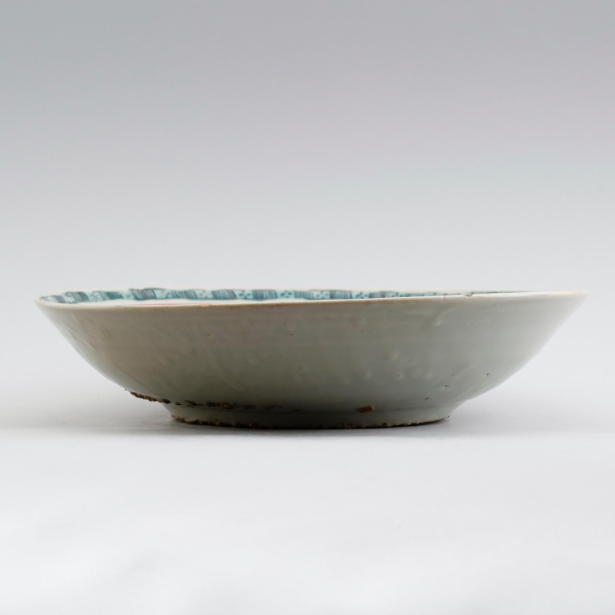 A iron red and green charger, Ming dynasty, Wanli (1573-1619).
