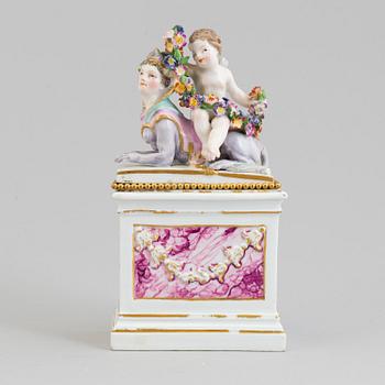 A Meissen Marcolini porcelain figure on a pidestal (1774-1814).