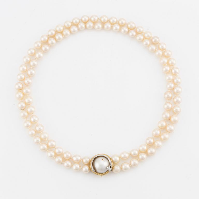 Ole Lynggaard, double-strand pearl necklace, clasp in 18K gold with a brilliant-cut diamond.