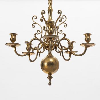 A Baroque style brass chandelier model no 205, Skultuna, 2002.