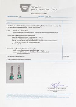 A pair of 18K white gold earrings with diamonds ca. 1.05 ct in total and emeralds ca. 4.20 ct in total. With certificate.