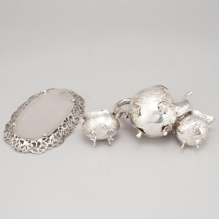 A silver mocha pot, creamer, sugar bowl and tray, some with mark of Gewe, Malmö 1950-51.