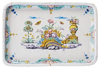 A Swedish Rococo faience tea table by Rörstrand 1771.