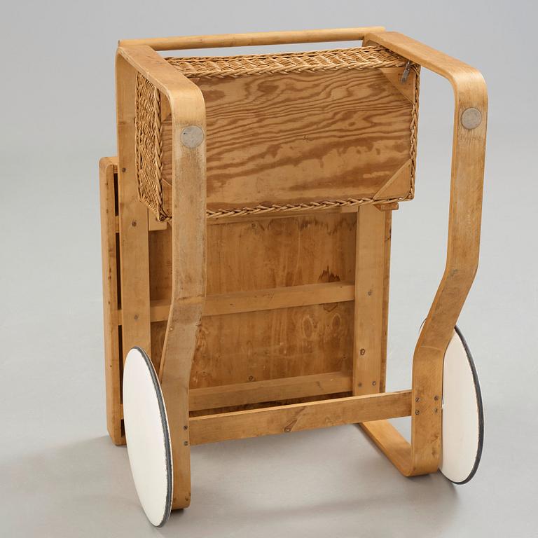Alvar Aalto, a birch serving trolley made by Aalto Design, Hedemora Sweden 1945-56, on license on behalf of Artek, Finland.