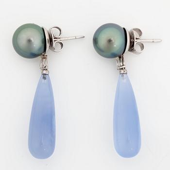 A pair of cultured Tahiti pearl, chalcedony and drop-shaped diamond earrings.