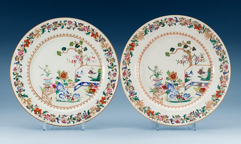 A pair of famille rose chargers, Qing dynasty, Qianlong (1736-95).