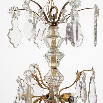 A Louis XV 18th century nine-light chandelier.