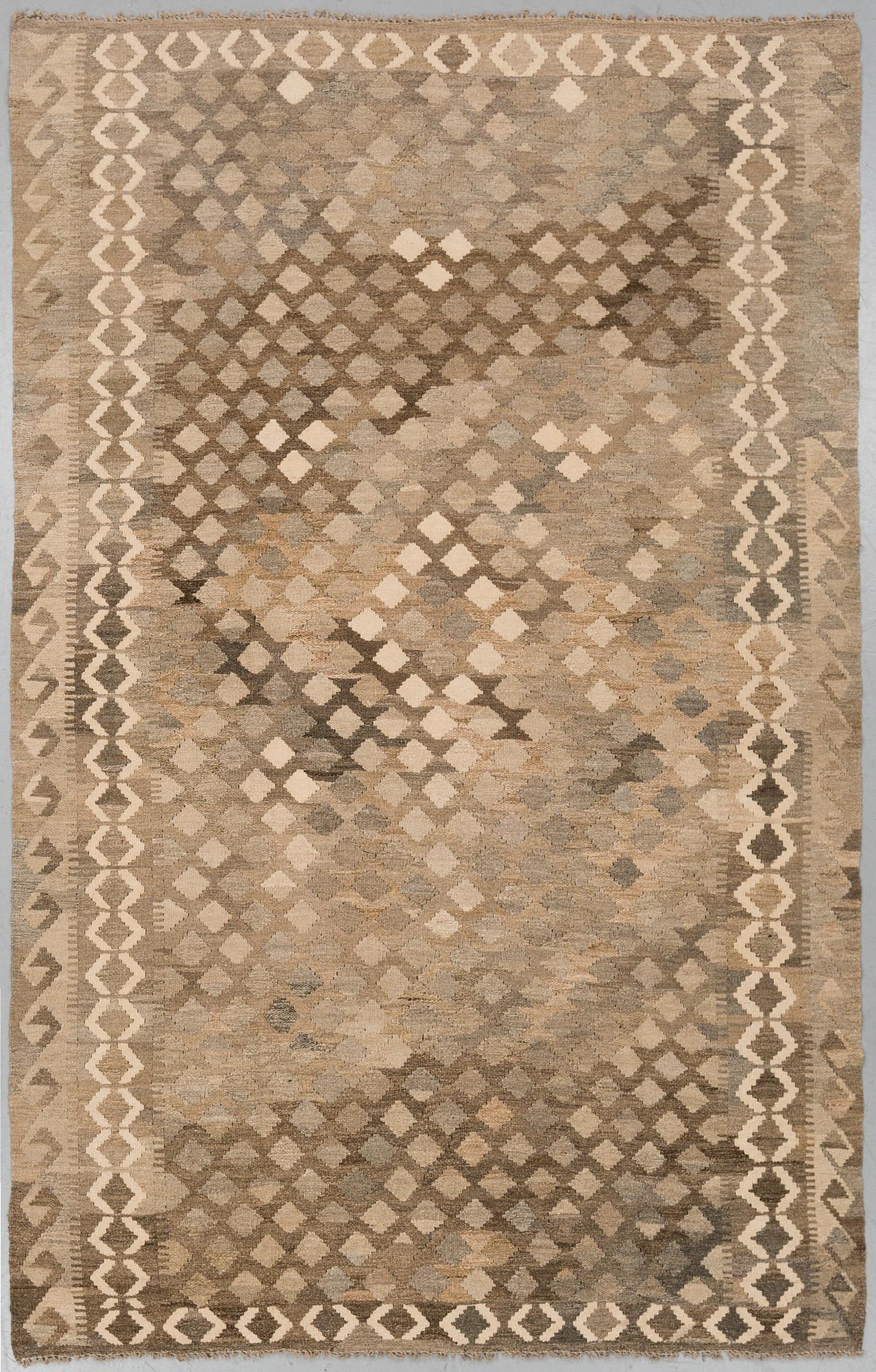 A carpet, kilim, around 254 x 160 cm.