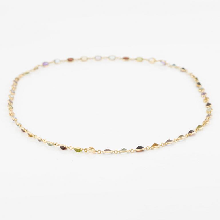 Necklace/bracelet in 18K gold with various coloured gemstones including topaz, citrine, amethyst, garnets, and peridot.