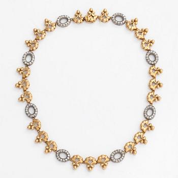 An 18K gold necklace with eight-cut diamonds totaling approximately 1.12 ct. With SJL-certificate.