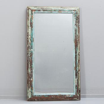 An Indian panted wood mirror 20th/21st century.