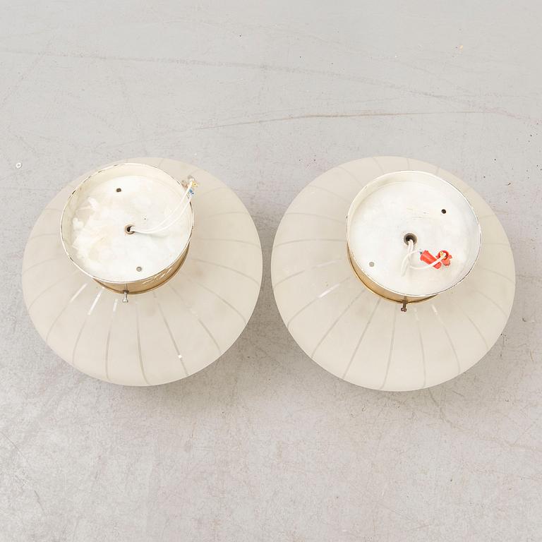 A pair of 1940/50s wall/ceiling lamps.