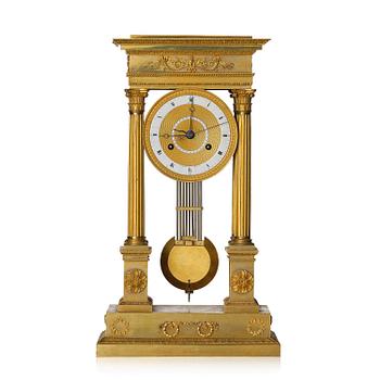 140. An Empire ormolu portico clock by Louis Bausse (watchmaker in Paris ca. 1807-24).