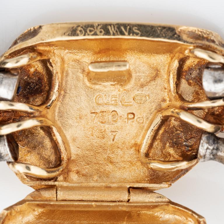 Ole Lynggaard, spänne i  18K guld med briljantslipad diamant.