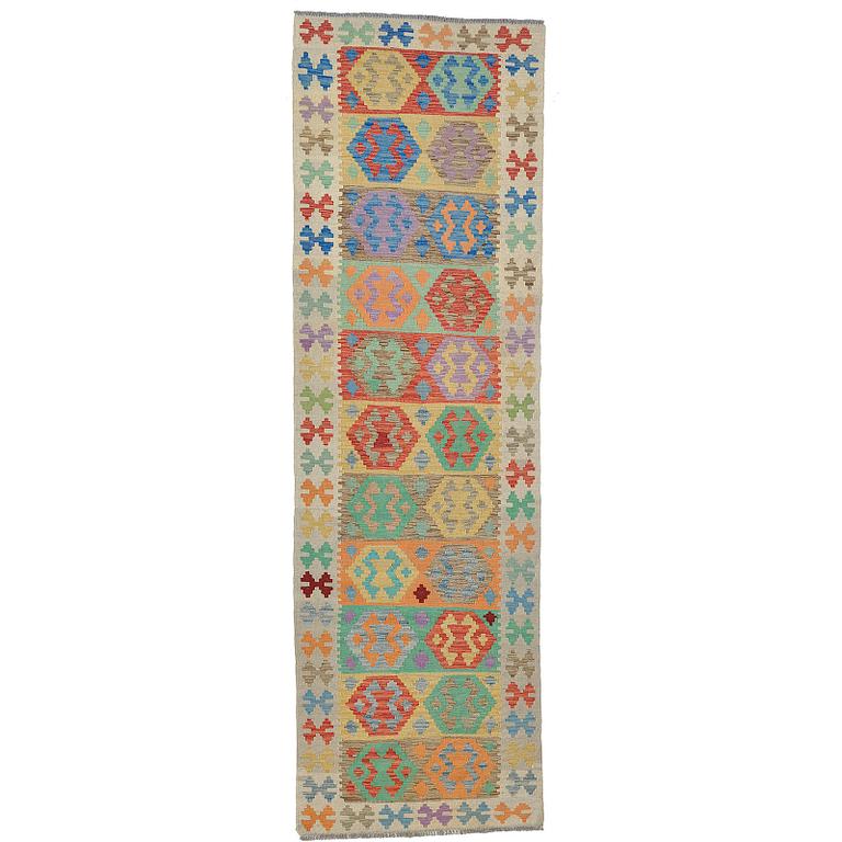 A runner, kilim, ca 301 x 91 cm.