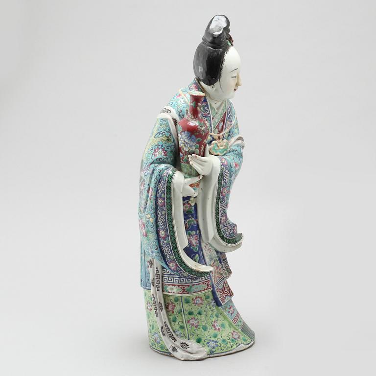 A porcelain figurine from China, late 19th or early 20th century.