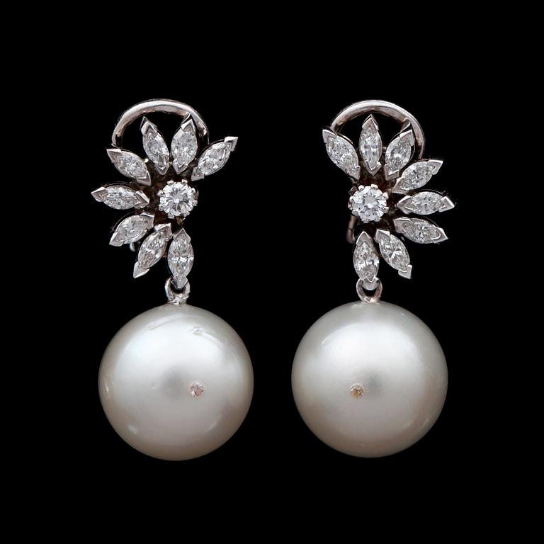 A pair of cultured pearl and diamond 1.74 cts earrings.