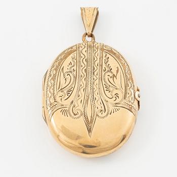 Medallion 14K gold.