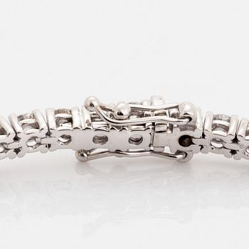 Brilliant-cut diamond tennis bracelet, with report HRD.