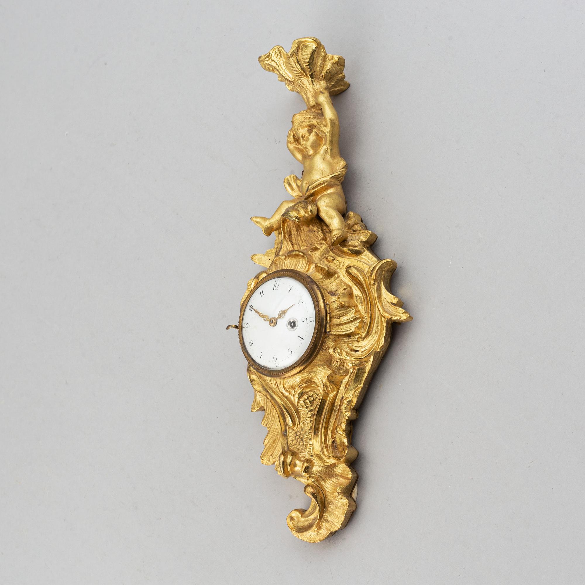 Väggur, rokokostil, late 19th or early 20th century.