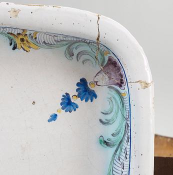 A Swedish Rococo faience tea table by Rörstrand 1771.