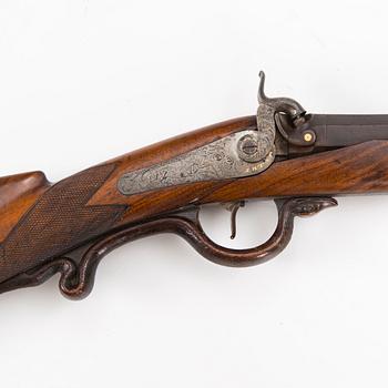 A mid 19th Century percussion rifle.