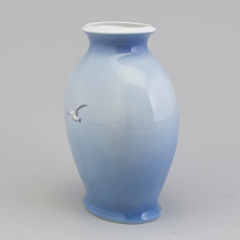 A porcelain vase by ROYAL COPENHAGEN.