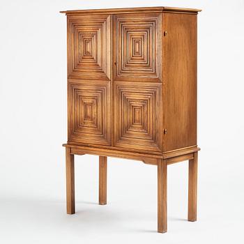 Oscar Nilsson, attributed to, a Swedish Modern oak cabinet, likely executed by Åfors Möbelfabrik, 1940s.
