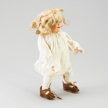 A mechanical bisque head doll by Heubach, probably 7669, Germany, c. 1912.