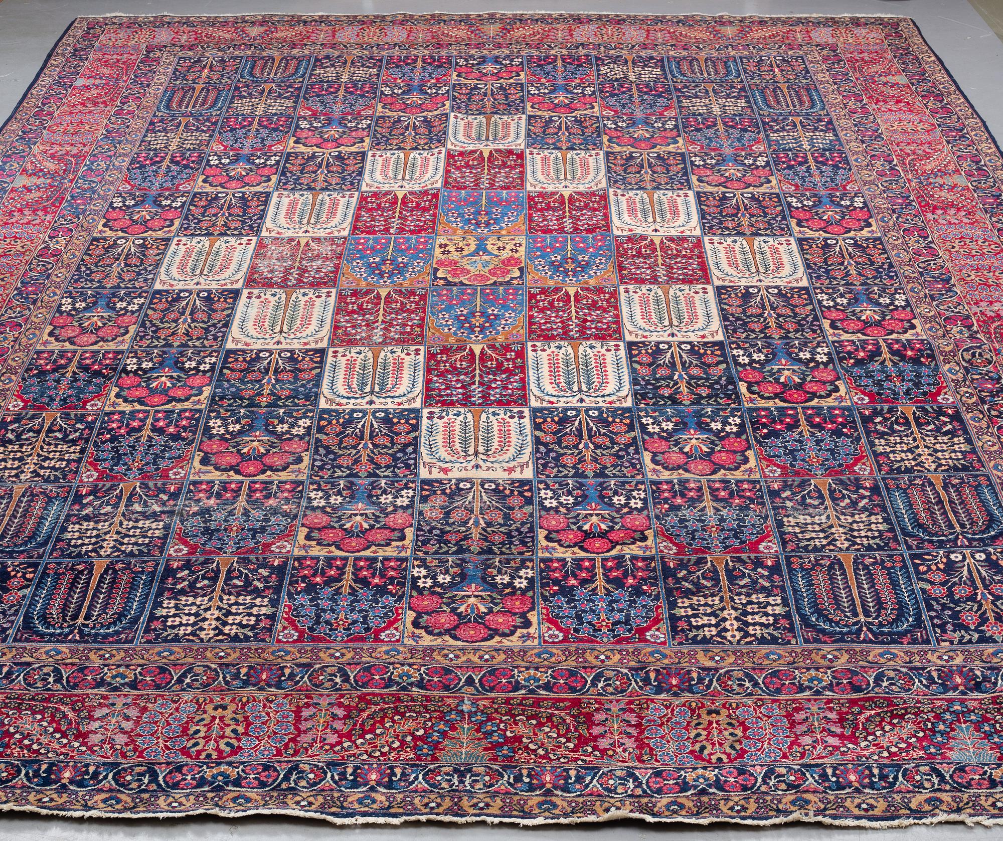 A carpet, an antique/a semi-antique Yezd, ca 557-562 x 366,5-370,5 cm.