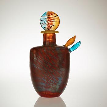 A Kjell Engman cast glass bottle with stopper, Kosta Boda 1991.