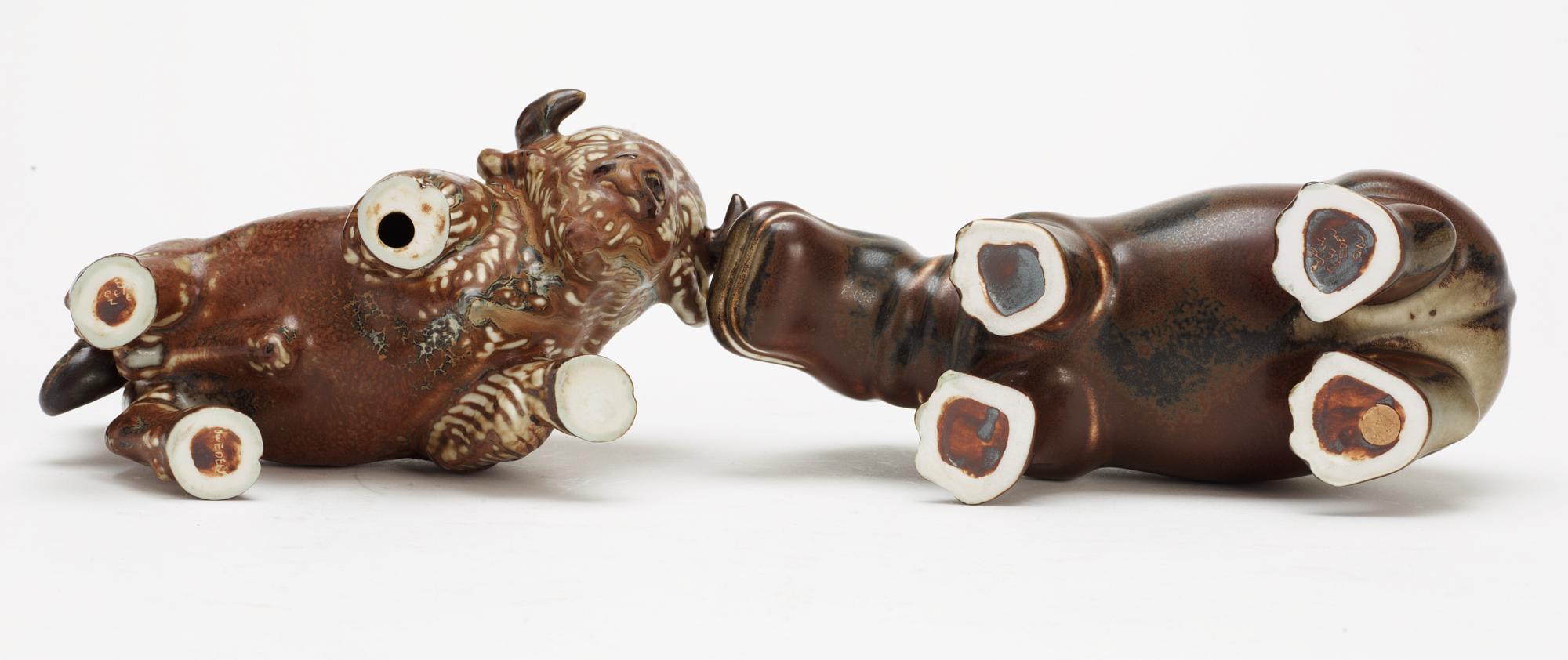 Two Gunnar Nylund stoneware figures, a bison and a hippo, Rörstrand.