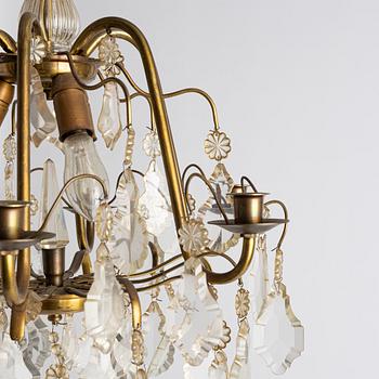 Ljuskrona, rokokostil, 1900-talets första hälft.