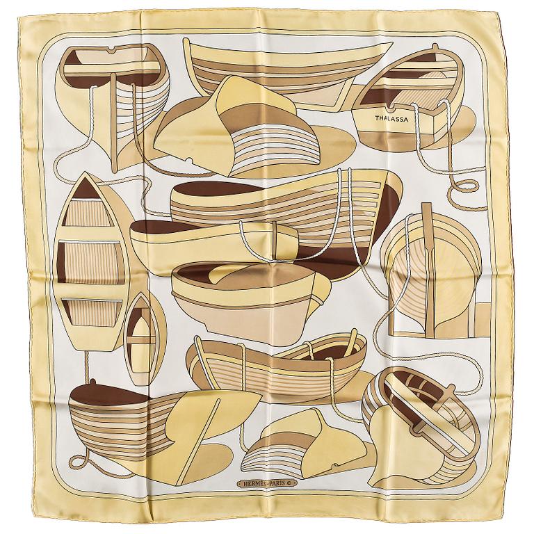 A set of three silk scarves by Hermès, "Etriers" and "Thalassa".