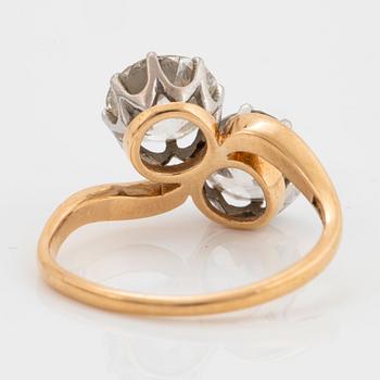 An 18K gold ring set with two old-cut diamonds with a total weight of ca 3.10 cts quality ca J/K si.