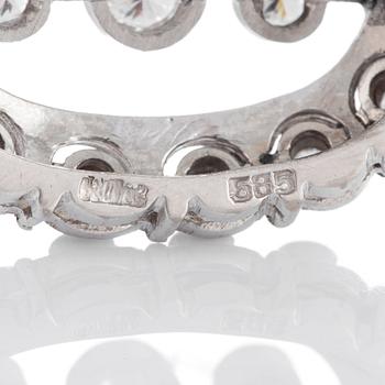 Brosch med runda briljantslipade diamanter total vikt ca 1.35 ct.
