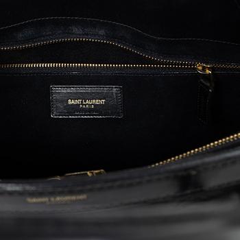Yves Saint Laurent, a 'Sac du Jour' handbag.