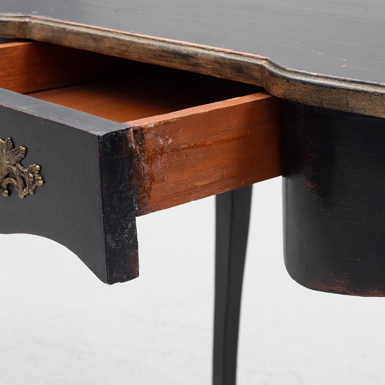 A rococo-style desk from the second half of the 20th century.