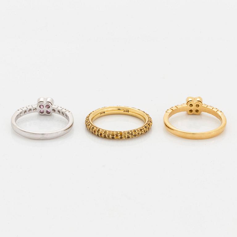 Yellow and pink sapphire and brilliant-cut diamond three rings.