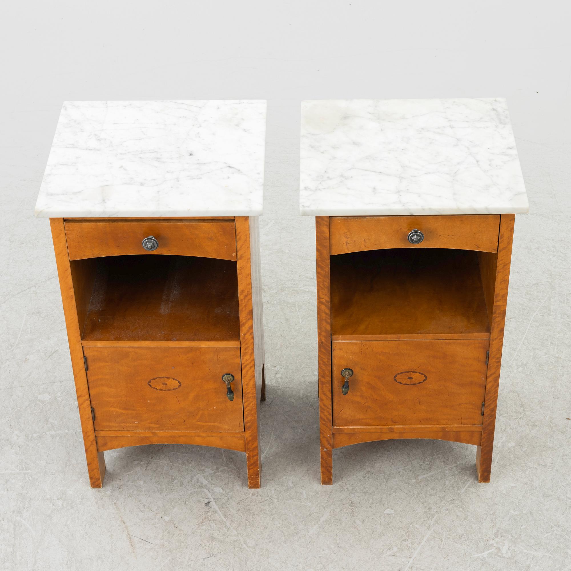A pair of early 20th century bedside tables.