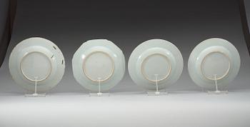 A set of four armorial famille rose dinner plates, Qing dynasty, Qianlong (1736-95).