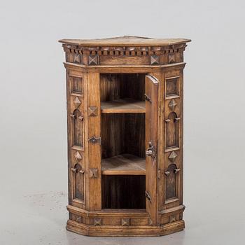 A 18th century corner cabinet.